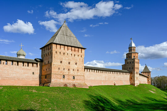 Tall towers and walls of the Novgorod Kremlin at sunset, Novgorod region of Russia