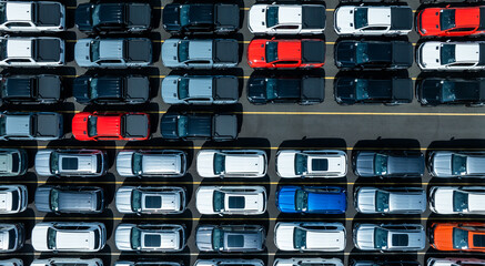 Aerial drone view of thousands of new cars parked at port for global export. © Nutchanart