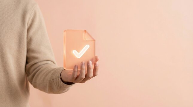 Checkmark document approval verification success quality complete hand holding glass icon for digital contract and paperless office business technology concepts on warm background.