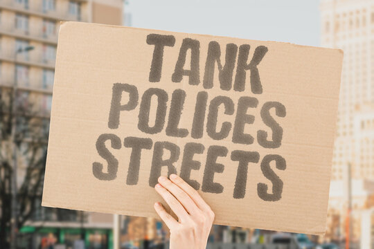 "Tank Polices Streets" Armored military vehicles are now deployed for routine domestic policing. ARMORED. VEHICLES. DEPLOYED. DOMESTIC. POLICING.