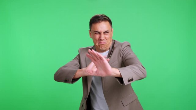 Disgusted man refusing something smelly and bad