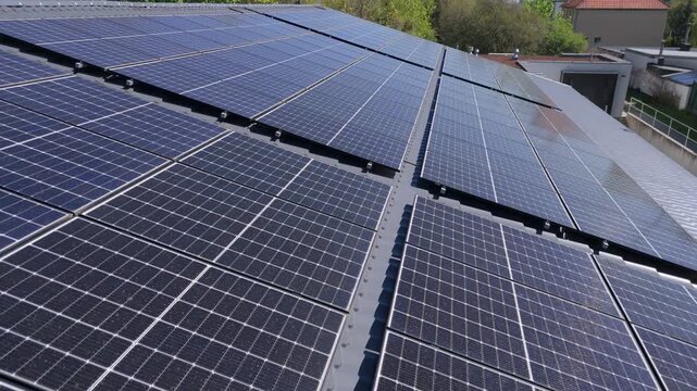 Wide High Angle View of Residential Rooftop Solar Panel Installation, Sustainable Home Energy System for Renewable Power Generation and Carbon Neutral Living