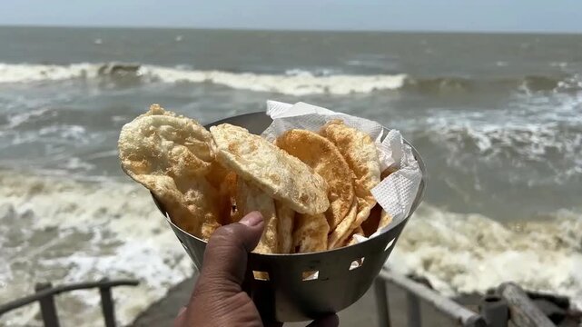 Dal puri served in a steel container near sea beach in Digha, Kolkata