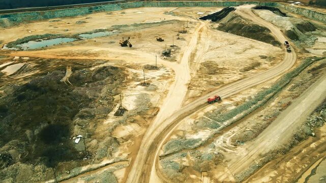 Aerial View of a Large Limestone Quarry with Heavy Machinery