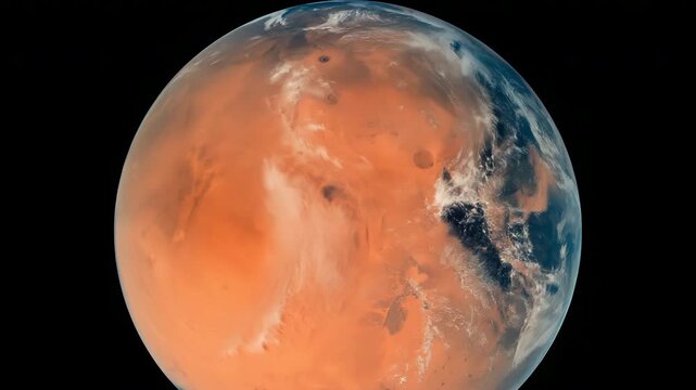 Full planetary disk showing red surface and polar clouds