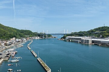 Fototapeta premium Aerial drone photo of Onomichi Channel and suspension bridge, Hiroshima, Japan
