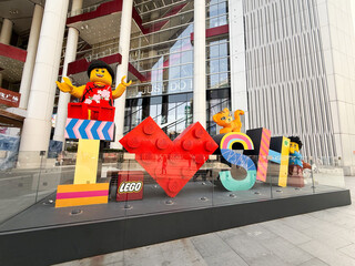 Fototapeta premium Shanghai, China - November 27, 2025: LEGO I Love Shanghai Installation in Front of Nike House of Innovation Building