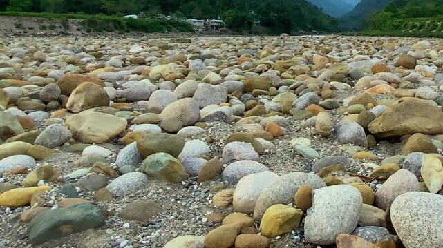 Natural rocky terrain with smooth stones across dry rive at Sylhet, Bangladesh.