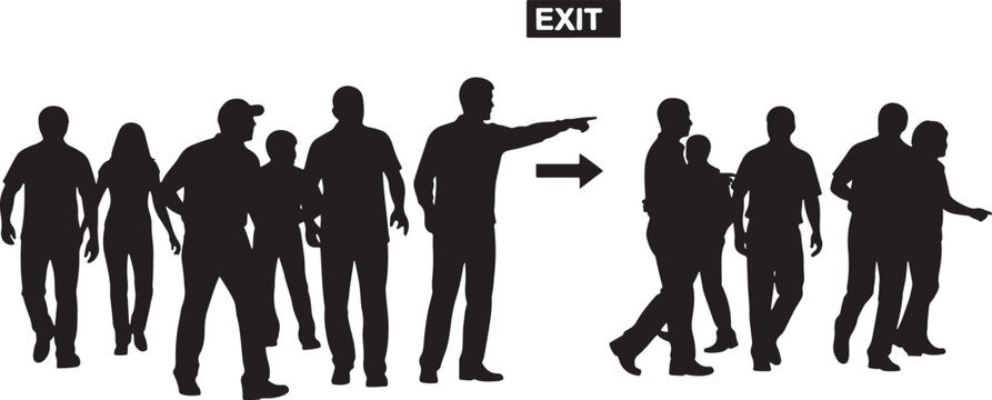 Group of people following an exit sign and arrow during an evacuation