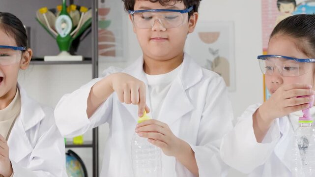 Thai Students in Lab Coats Perform Chemical Balloon Inflation Experiment