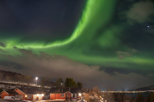 Dancing Lights Illuminate the Sky Above Narvik, Norway on a Chilly Winter Night