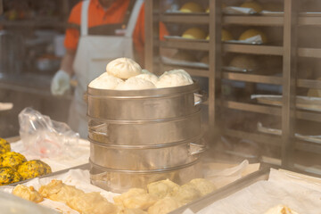 Steamed buns and other dim sum at a Chinese street food stall © zhouyilu