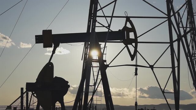 A pumpjack is the overground drive for a reciprocating piston pump in an oil well, commonly known as a "nodding donkey" or beam pump.