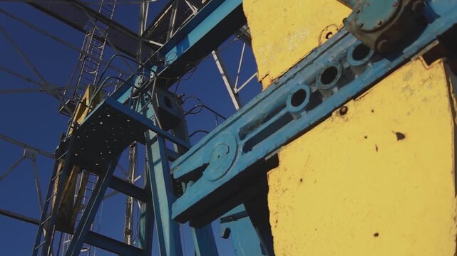 A pumpjack is the overground drive for a reciprocating piston pump in an oil well, commonly known as a "nodding donkey" or beam pump.