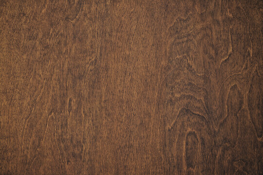 brown wooden table, top view. dark board texture