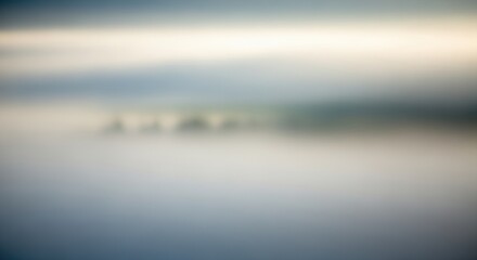 Fototapeta premium Abstract Blurred Landscape with Soft Colors and Atmospheric Effect.