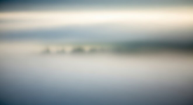 Abstract Blurred Landscape with Soft Colors and Atmospheric Effect.