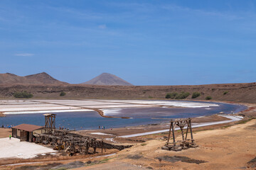 Fototapeta premium The unique salt mines of Pedra de Lume on the Island of Sal in Cape Verde. The salt lakes are located in a moon like crater of an old volcano.The former salt winning facotry is a hidden treasure that 