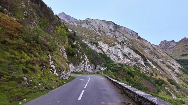 Driving up the Col d'Aubisque, France. Mountain pass in the French Pyrenees massif, symbol of the Tour de France in Bearn, France. Driving from Eaux-Bonnes to Gourette