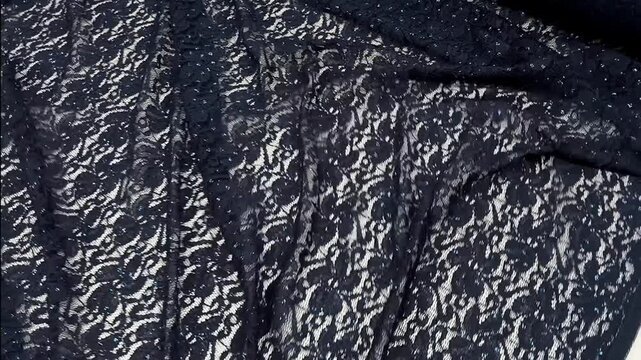 Premium dark azure textile featuring intricate floral lace patterns adorned with subtle sparkling sequins for a sophisticated luminous finish perfect for evening wear and formal couture designs