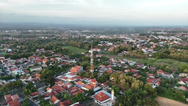 Aerial View of Telecommunication Tower BTS in the Middle of Indonesian Residential Area