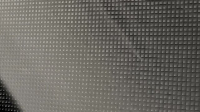 A durable black faux leather material features an embossed diamond grid texture with a soft black felt backing making it ideal for upholstery car interiors and luxury craft projects
