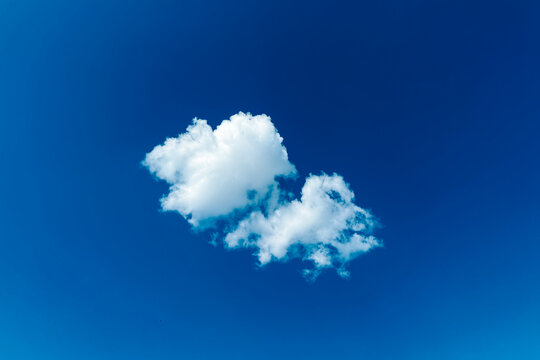 White cloud floating in a clear blue sky