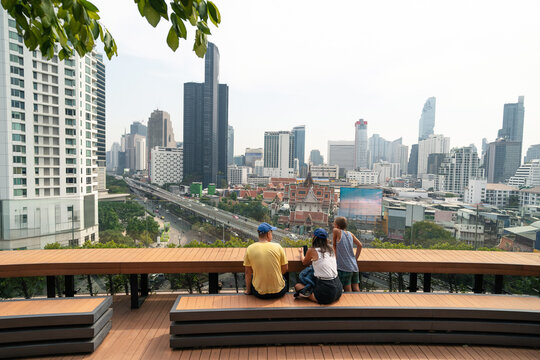Family on rooftop in Bangkok, Sathorn area