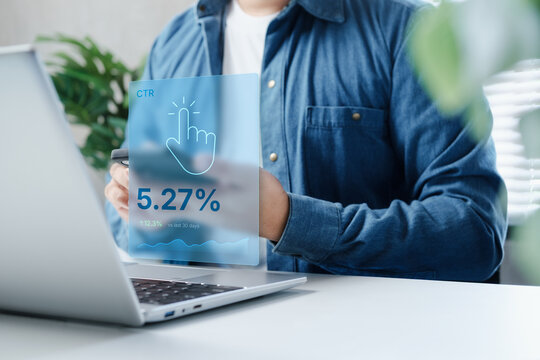 Business professional monitoring CTR performance dashboard with click through rate analytics, holographic KPI interface, digital marketing metrics and SaaS data visualization on laptop and smartphone