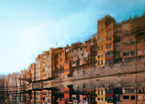 Abstract reflection of colorful Girona riverside houses in Onyar river Spain. Artistic urban background for travel editorials creative tourism design and modern city concepts