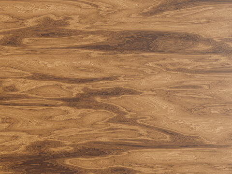 Rich burl wood texture with swirling organic patterns and warm brown tones throughout.