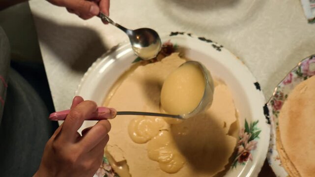 Close up slow motion video of custard dough preparation with flour starch sieve and rolling pin in detailed baking process in Full HD