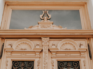 Obraz premium Ornate Historic Door Detail with Decorative Carvings
