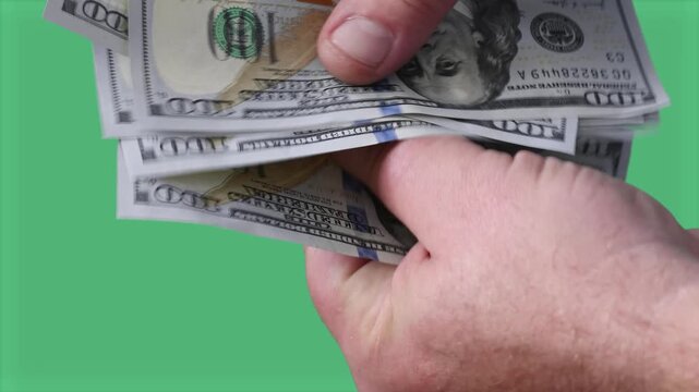 Recounting and returning dollar bills in a demonstration of honesty and integrity during a transaction green screen