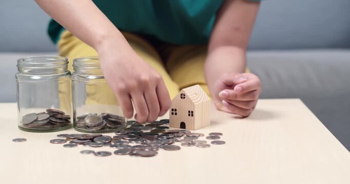 Learn how to save effectively for your dream home using coins and budgeting techniques.