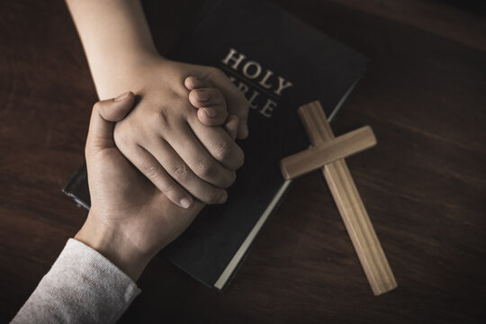 Christian group are praying to god with the bible and sharing the gospel. Concept of faith for god. Concept of faith for god.
