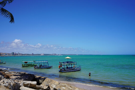 Traditional Jangada Boats Anchored Near Tropical Beach Shore, Maceio, Brazil