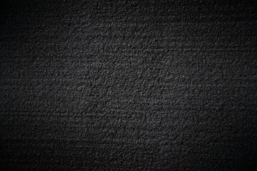 Fototapeta premium Black Rough Plastered Wall Texture Abstract Background（ザラザラした質感の塗り壁のモノクロ背景） 