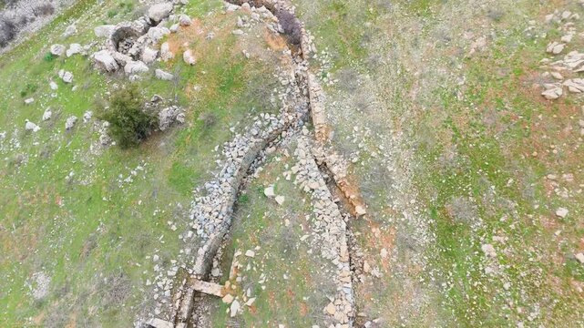 Drone view of historic WW2 trenches carved into rocky terrain in Qattin Azar, Baskinta, Lebanon, highlighting the location&rsquo;s military and archaeological character.