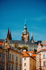 Obraz premium Vivid Prague View. Bright View Of Prague Highlighting Its Gothic And Baroque Architectural Masterpieces