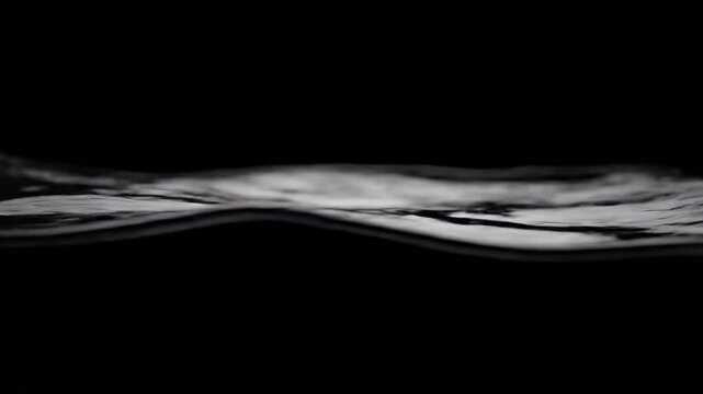 Dynamic fluid wave crests and troughs creating abstract artistic motion across a shadowy canvas illustrating the raw elemental power of liquid energy in perpetual swirling transformations