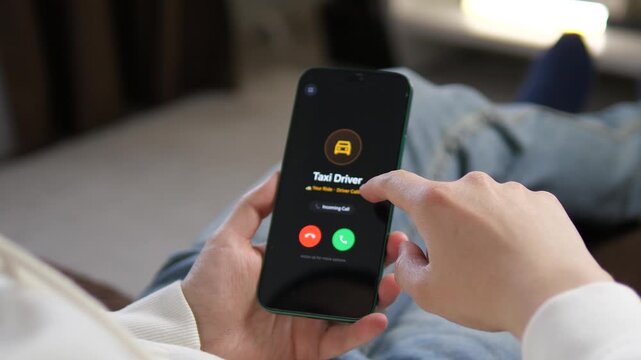 Urban living made easy. High-quality footage of a person receiving a call from a taxi driver on a smartphone. Perfect for ride-sharing apps, modern transport services, and digital lifestyle