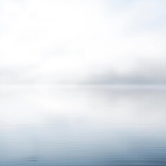 Fototapeta premium Mist-kissed surface of a tranquil lake, where light dances in soft, diffused ripples, creating a dreamlike canvas, hazy, abstract