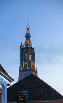 European Onze Lieve Vrouwetoren clock tower against twilight sky in Amersfoort, Netherlands, Onze-Lieve-Vrouwetoren