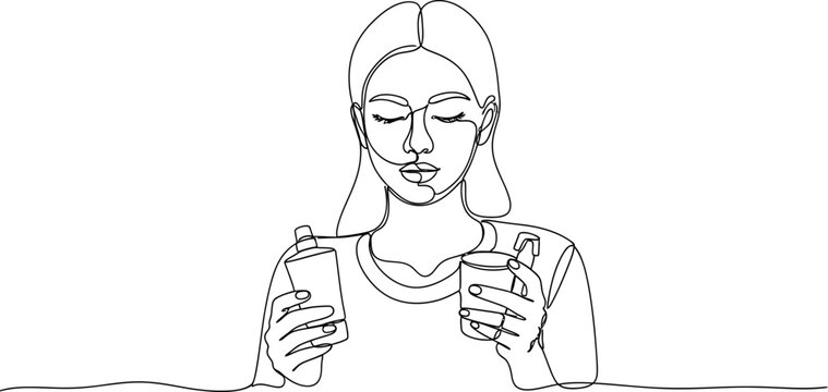 Continuous line drawing of a woman holding two cosmetic bottles, close-up.
