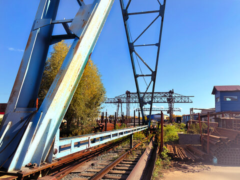 Gantry crane. The crane rides on rails. Blue sky photo