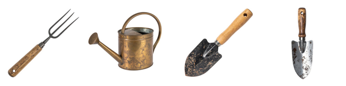 Vintage gardening tools including metal watering can hand trowel and cultivator fork