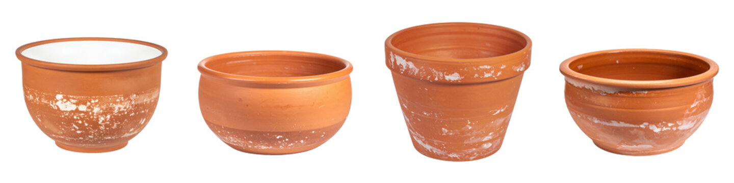 Four various empty clay flower pots arranged in  horizontal row against  white space