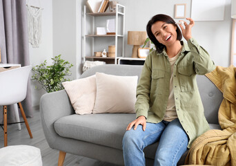 Obraz premium Young girl with ear drops at home
