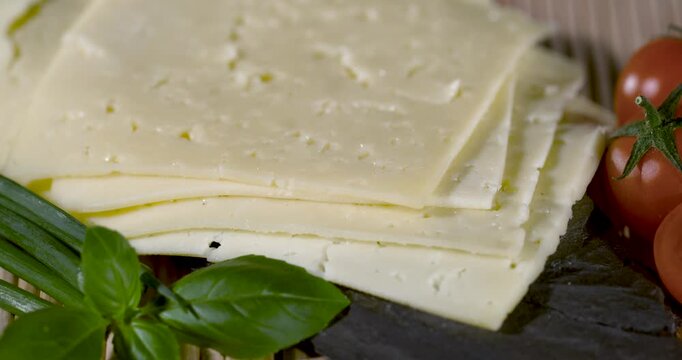 Super Slow Motion Sandwich Chef Layering Sliced Cheese With Basil And Tomatoes